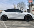 Белый Тесла Model Y, объемом двигателя 0 л и пробегом 65 тыс. км за 25300 $, фото 1 на Automoto.ua
