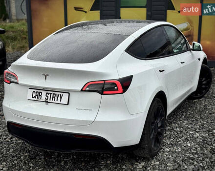 Білий Тесла Model Y, об'ємом двигуна 0 л та пробігом 62 тис. км за 27400 $, фото 50 на Automoto.ua