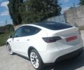 Білий Тесла Model Y, об'ємом двигуна 0 л та пробігом 214 тис. км за 19999 $, фото 1 на Automoto.ua