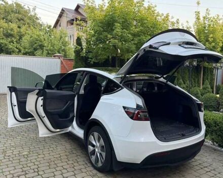 Белый Тесла Model Y, объемом двигателя 0 л и пробегом 97 тыс. км за 26500 $, фото 19 на Automoto.ua