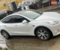 Білий Тесла Model Y, об'ємом двигуна 0 л та пробігом 130 тис. км за 25800 $, фото 1 на Automoto.ua