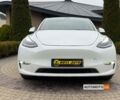 Белый Тесла Model Y, объемом двигателя 82 л и пробегом 65 тыс. км за 28700 $, фото 1 на Automoto.ua