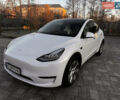 Белый Тесла Model Y, объемом двигателя 0 л и пробегом 51 тыс. км за 28500 $, фото 1 на Automoto.ua