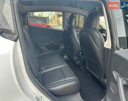 Белый Тесла Model Y, объемом двигателя 0 л и пробегом 50 тыс. км за 27700 $, фото 10 на Automoto.ua