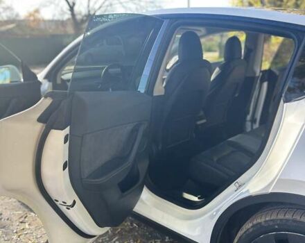 Білий Тесла Model Y, об'ємом двигуна 0 л та пробігом 62 тис. км за 29700 $, фото 13 на Automoto.ua