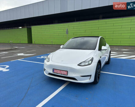 Белый Тесла Model Y, объемом двигателя 0 л и пробегом 68 тыс. км за 35000 $, фото 1 на Automoto.ua