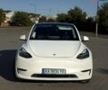 Білий Тесла Model Y, об'ємом двигуна 0 л та пробігом 101 тис. км за 26000 $, фото 1 на Automoto.ua