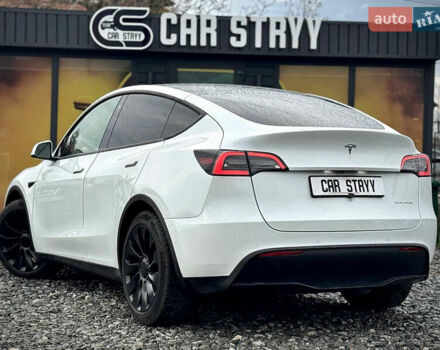 Білий Тесла Model Y, об'ємом двигуна 0 л та пробігом 62 тис. км за 27400 $, фото 55 на Automoto.ua