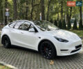 Белый Тесла Model Y, объемом двигателя 0 л и пробегом 49 тыс. км за 35000 $, фото 1 на Automoto.ua