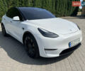 Белый Тесла Model Y, объемом двигателя 0 л и пробегом 53 тыс. км за 23000 $, фото 1 на Automoto.ua