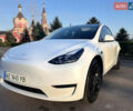 Белый Тесла Model Y, объемом двигателя 0 л и пробегом 62 тыс. км за 28000 $, фото 2 на Automoto.ua