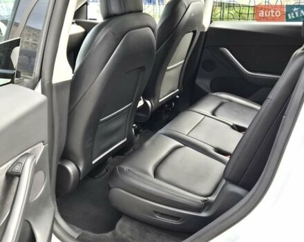 Белый Тесла Model Y, объемом двигателя 0 л и пробегом 70 тыс. км за 31500 $, фото 11 на Automoto.ua