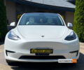 Белый Тесла Model Y, объемом двигателя 75 л и пробегом 49 тыс. км за 31000 $, фото 1 на Automoto.ua