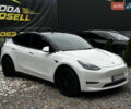 Белый Тесла Model Y, объемом двигателя 0 л и пробегом 57 тыс. км за 30100 $, фото 1 на Automoto.ua