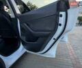 Белый Тесла Model Y, объемом двигателя 0 л и пробегом 59 тыс. км за 28800 $, фото 69 на Automoto.ua