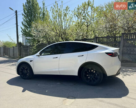 Білий Тесла Model Y, об'ємом двигуна 0 л та пробігом 67 тис. км за 23999 $, фото 4 на Automoto.ua