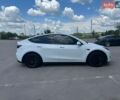 Білий Тесла Model Y, об'ємом двигуна 0 л та пробігом 69 тис. км за 27500 $, фото 1 на Automoto.ua