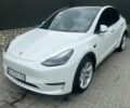 Білий Тесла Model Y, об'ємом двигуна 0 л та пробігом 55 тис. км за 24099 $, фото 1 на Automoto.ua