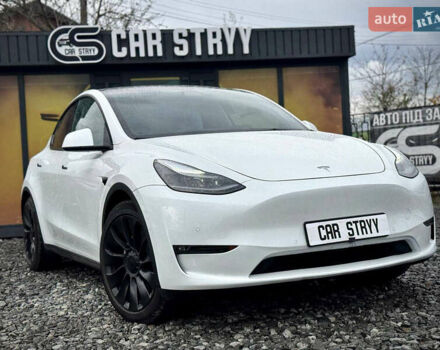 Білий Тесла Model Y, об'ємом двигуна 0 л та пробігом 62 тис. км за 27400 $, фото 10 на Automoto.ua