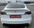 Білий Тесла Model Y, об'ємом двигуна 0 л та пробігом 52 тис. км за 25900 $, фото 2 на Automoto.ua
