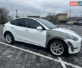 Білий Тесла Model Y, об'ємом двигуна 0 л та пробігом 100 тис. км за 23999 $, фото 11 на Automoto.ua