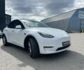Белый Тесла Model Y, объемом двигателя 0 л и пробегом 58 тыс. км за 25990 $, фото 1 на Automoto.ua