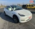 Білий Тесла Model Y, об'ємом двигуна 0 л та пробігом 61 тис. км за 22300 $, фото 1 на Automoto.ua