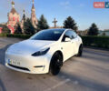 Белый Тесла Model Y, объемом двигателя 0 л и пробегом 62 тыс. км за 28000 $, фото 1 на Automoto.ua