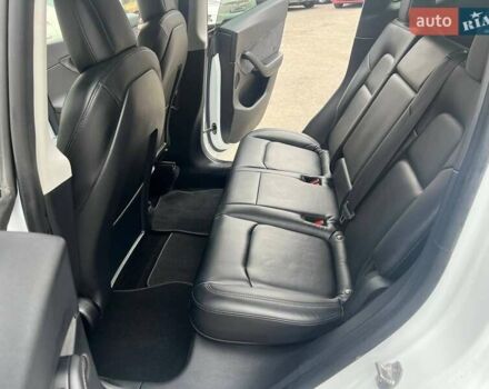 Белый Тесла Model Y, объемом двигателя 0 л и пробегом 31 тыс. км за 24999 $, фото 1 на Automoto.ua