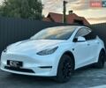 Білий Тесла Model Y, об'ємом двигуна 0 л та пробігом 55 тис. км за 26000 $, фото 1 на Automoto.ua