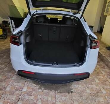 Белый Тесла Model Y, объемом двигателя 0 л и пробегом 56 тыс. км за 26500 $, фото 21 на Automoto.ua