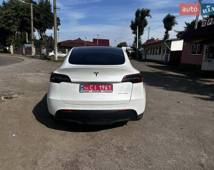 Белый Тесла Model Y, объемом двигателя 0 л и пробегом 73 тыс. км за 25000 $, фото 3 на Automoto.ua