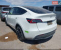 Белый Тесла Model Y, объемом двигателя 0 л и пробегом 48 тыс. км за 10000 $, фото 1 на Automoto.ua