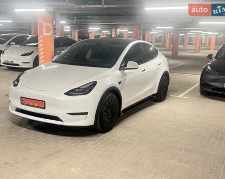Белый Тесла Model Y, объемом двигателя 0 л и пробегом 87 тыс. км за 28999 $, фото 2 на Automoto.ua