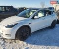 Белый Тесла Model Y, объемом двигателя 0 л и пробегом 25 тыс. км за 13000 $, фото 1 на Automoto.ua