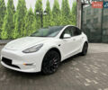 Білий Тесла Model Y, об'ємом двигуна 0 л та пробігом 84 тис. км за 28300 $, фото 1 на Automoto.ua