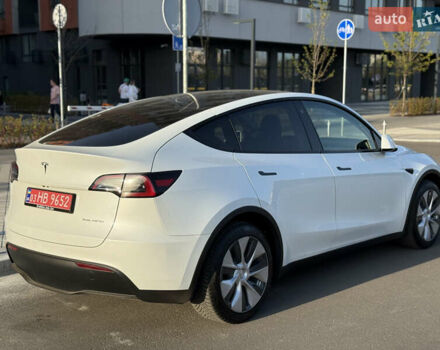 Білий Тесла Model Y, об'ємом двигуна 0 л та пробігом 55 тис. км за 33014 $, фото 12 на Automoto.ua