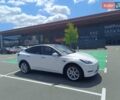 Белый Тесла Model Y, объемом двигателя 0 л и пробегом 42 тыс. км за 25990 $, фото 1 на Automoto.ua