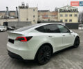 Білий Тесла Model Y, об'ємом двигуна 0 л та пробігом 84 тис. км за 28300 $, фото 4 на Automoto.ua