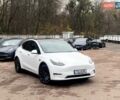 Белый Тесла Model Y, объемом двигателя 0 л и пробегом 49 тыс. км за 34999 $, фото 1 на Automoto.ua