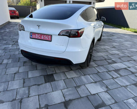 Білий Тесла Model Y, об'ємом двигуна 0 л та пробігом 49 тис. км за 24900 $, фото 1 на Automoto.ua