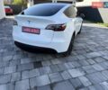 Білий Тесла Model Y, об'ємом двигуна 0 л та пробігом 49 тис. км за 24900 $, фото 1 на Automoto.ua