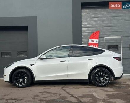 Білий Тесла Model Y, об'ємом двигуна 0 л та пробігом 36 тис. км за 30999 $, фото 4 на Automoto.ua