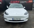 Белый Тесла Model Y, объемом двигателя 0 л и пробегом 59 тыс. км за 29000 $, фото 1 на Automoto.ua