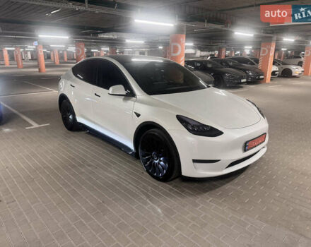 Белый Тесла Model Y, объемом двигателя 0 л и пробегом 87 тыс. км за 28999 $, фото 1 на Automoto.ua