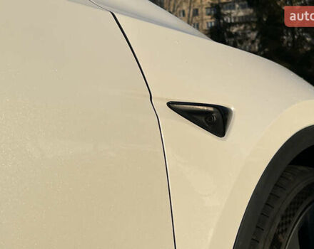 Білий Тесла Model Y, об'ємом двигуна 0 л та пробігом 73 тис. км за 27750 $, фото 21 на Automoto.ua
