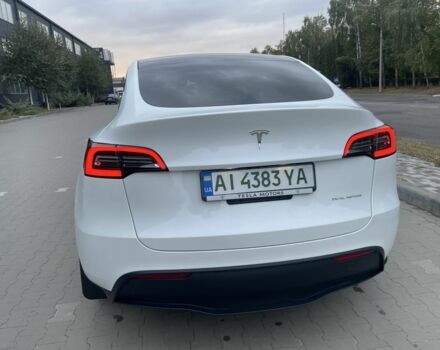 Білий Тесла Model Y, об'ємом двигуна 0 л та пробігом 64 тис. км за 28500 $, фото 4 на Automoto.ua