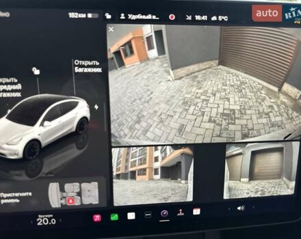 Белый Тесла Model Y, объемом двигателя 0 л и пробегом 62 тыс. км за 24999 $, фото 25 на Automoto.ua