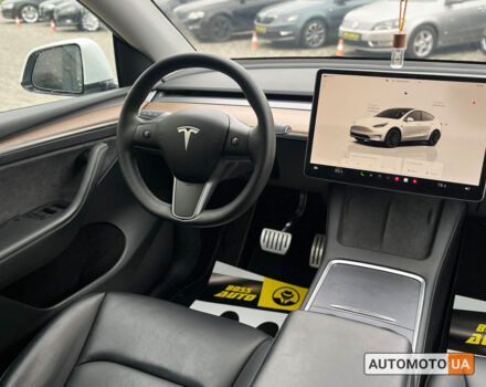 Білий Тесла Model Y, об'ємом двигуна 82 л та пробігом 33 тис. км за 35000 $, фото 21 на Automoto.ua