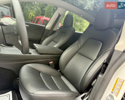 Белый Тесла Model Y, объемом двигателя 0 л и пробегом 72 тыс. км за 24750 $, фото 25 на Automoto.ua